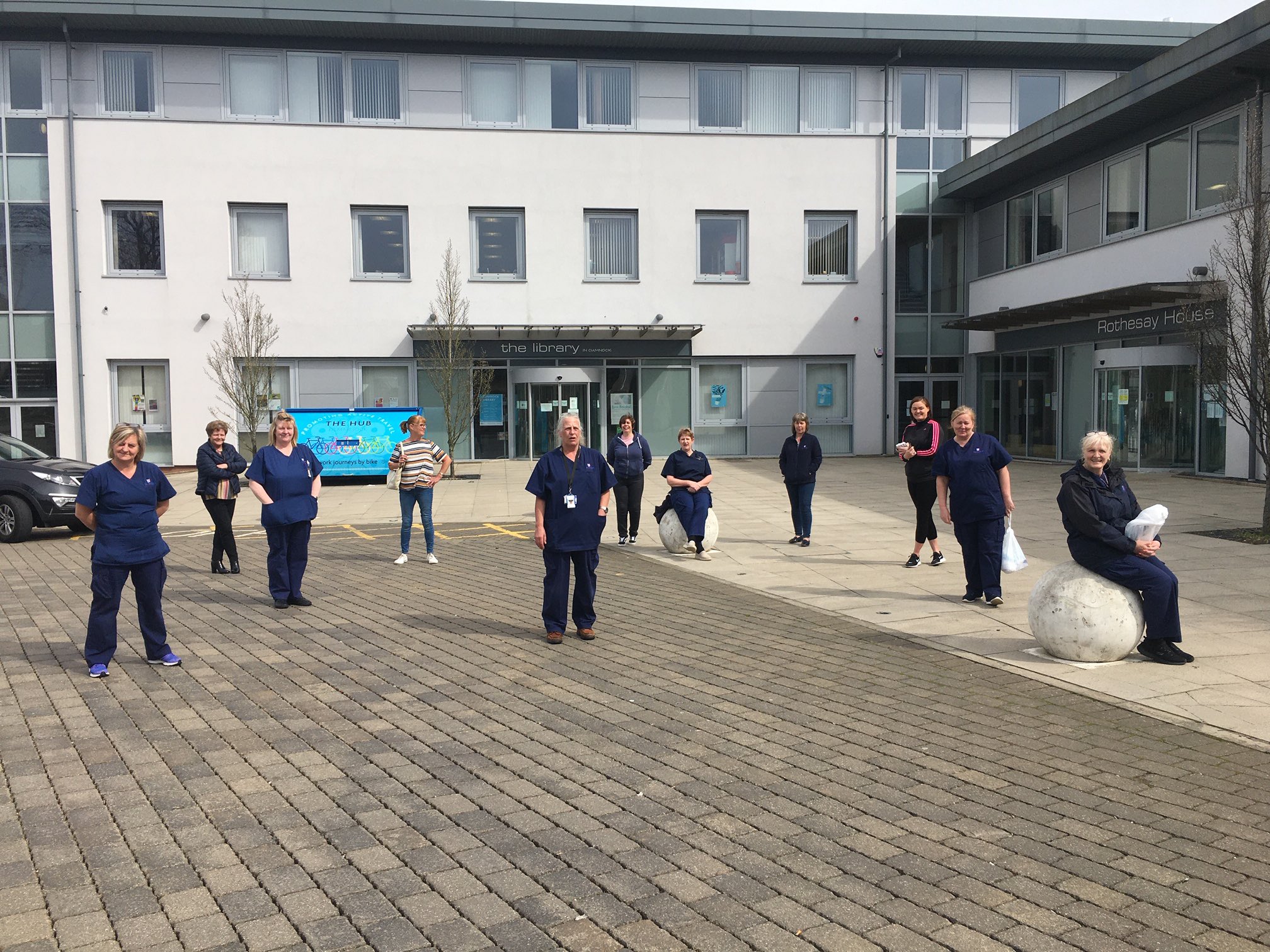 Social care staff standing outside Rothesay House