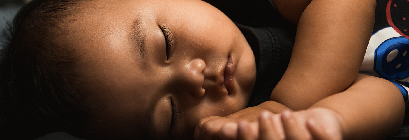 close up of a toddler sleeping