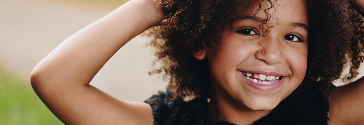 child smiling at camera