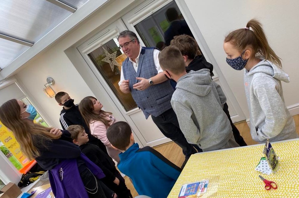 Scotty entertaining a group of primary school children