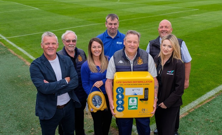 Auchinleck Talbot FC with their new defibrillator