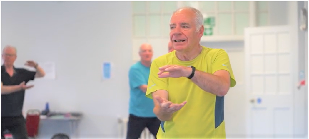 Older men enjoying an exercise class with CHAT