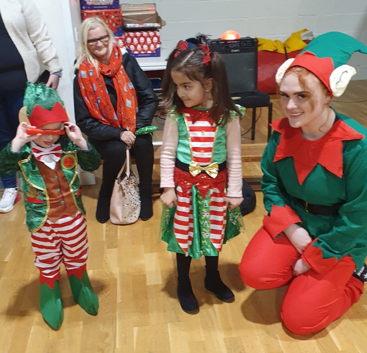 Children dressed as elves at the party