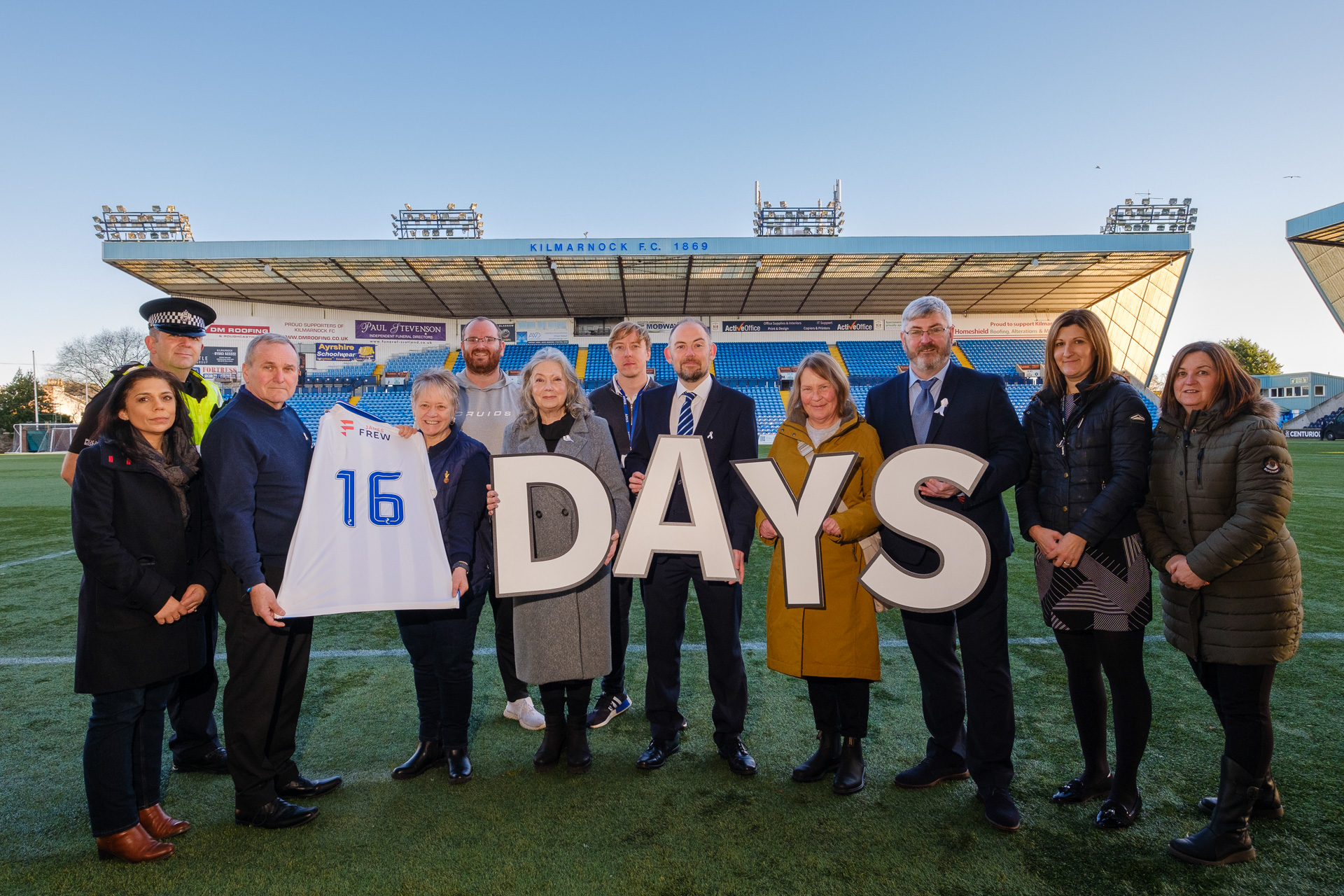 Supporters of 16 Days of Action campaign at Rugby Park.