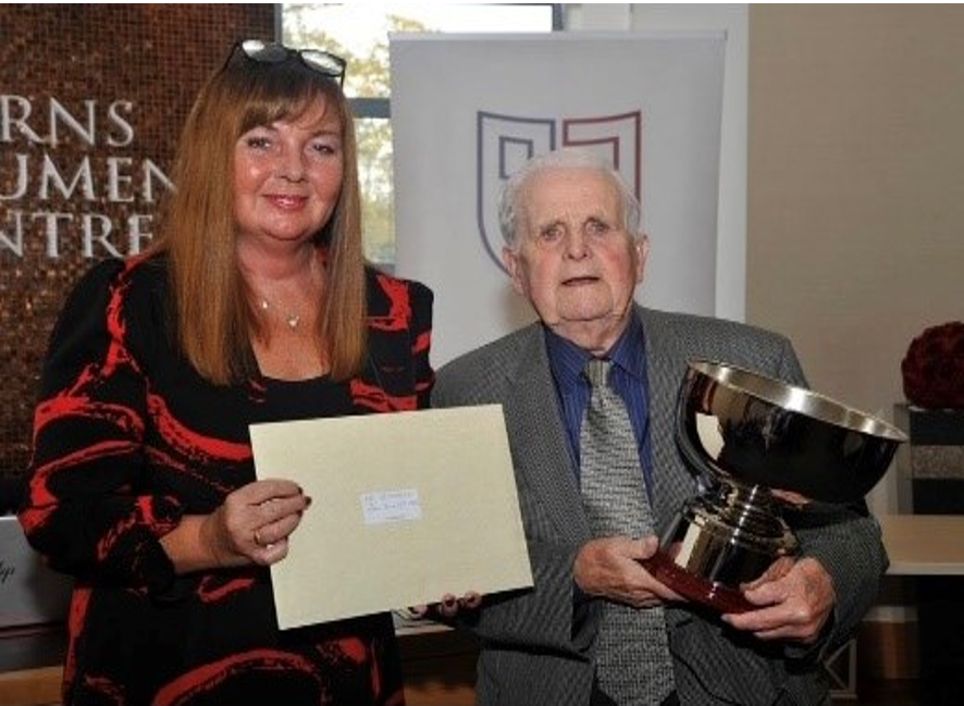 Sharon Tomlinson presenting the Jennifer Elliot commemorative award