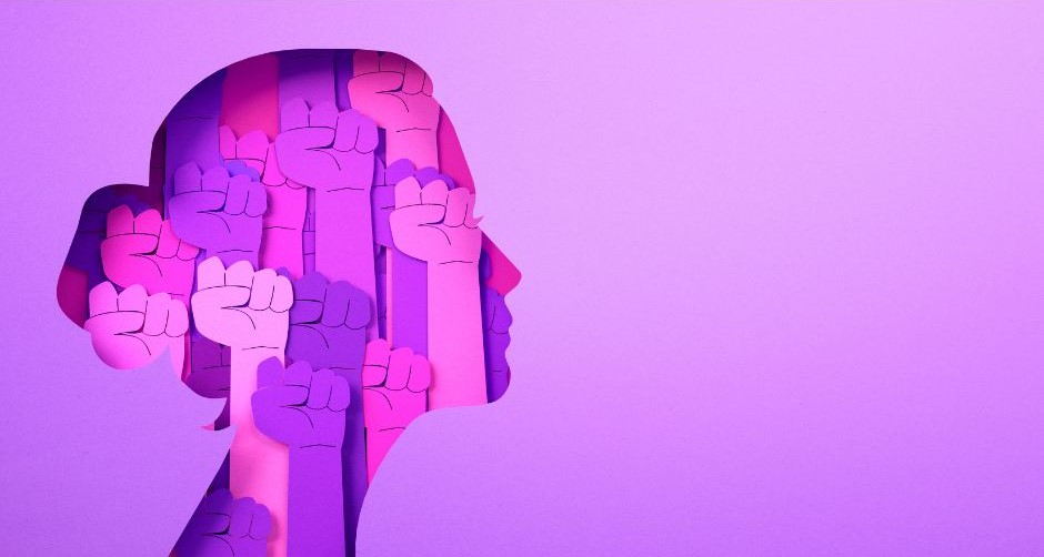Silhouette of a woman's head in profile view, against a pink and purple background
