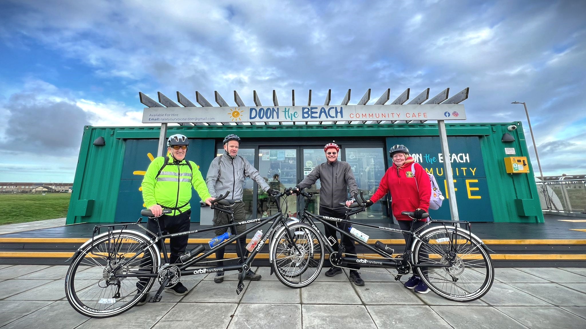 The North Ayrshire Tandem Cycling group at a rest stop during an outing