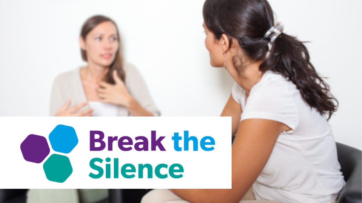 Break the Silence logo - woman attending consultation